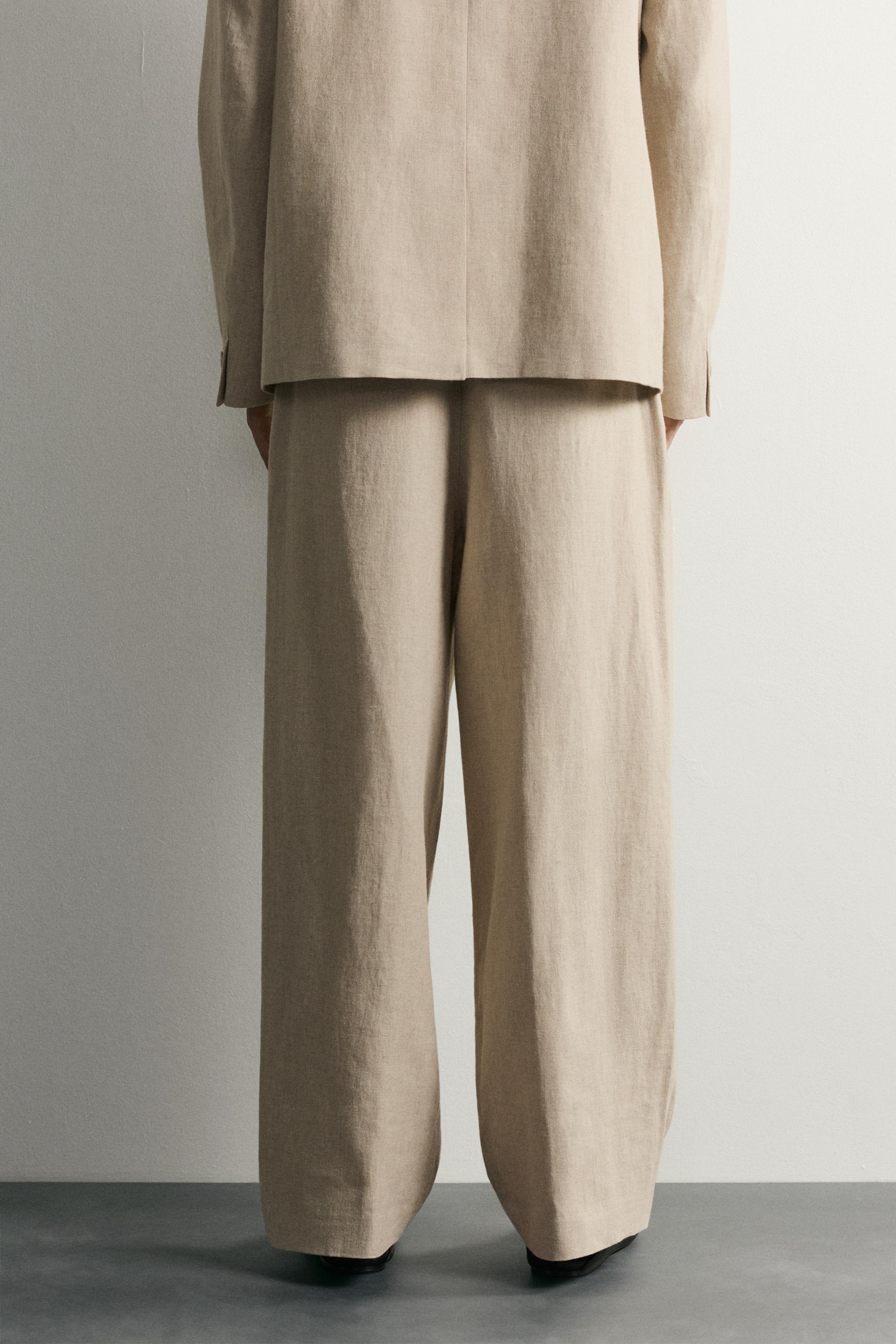 RELAXED FIT PLEATED SUIT PANTS